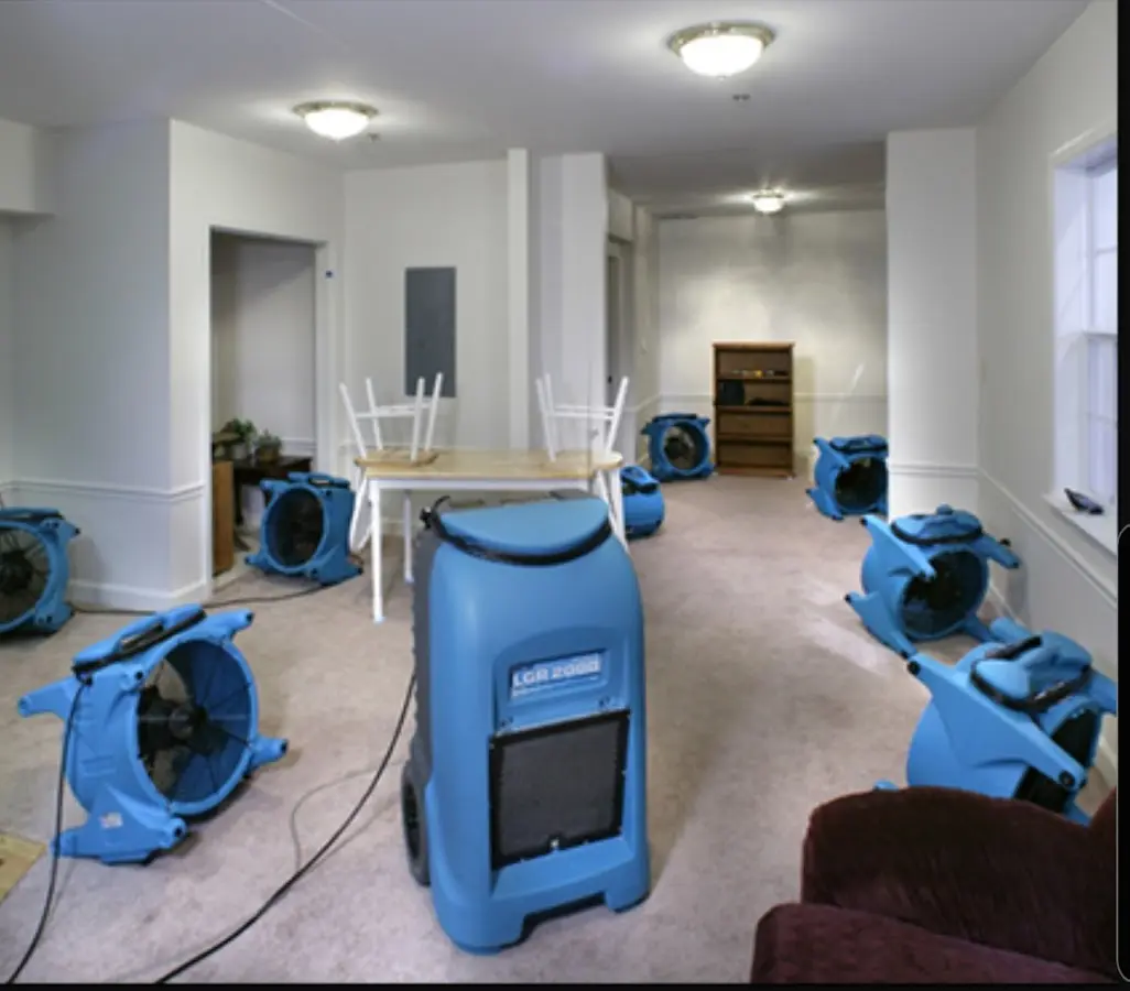 Air movers and dehumidifier setup for Water Damage Restoration in Kittery